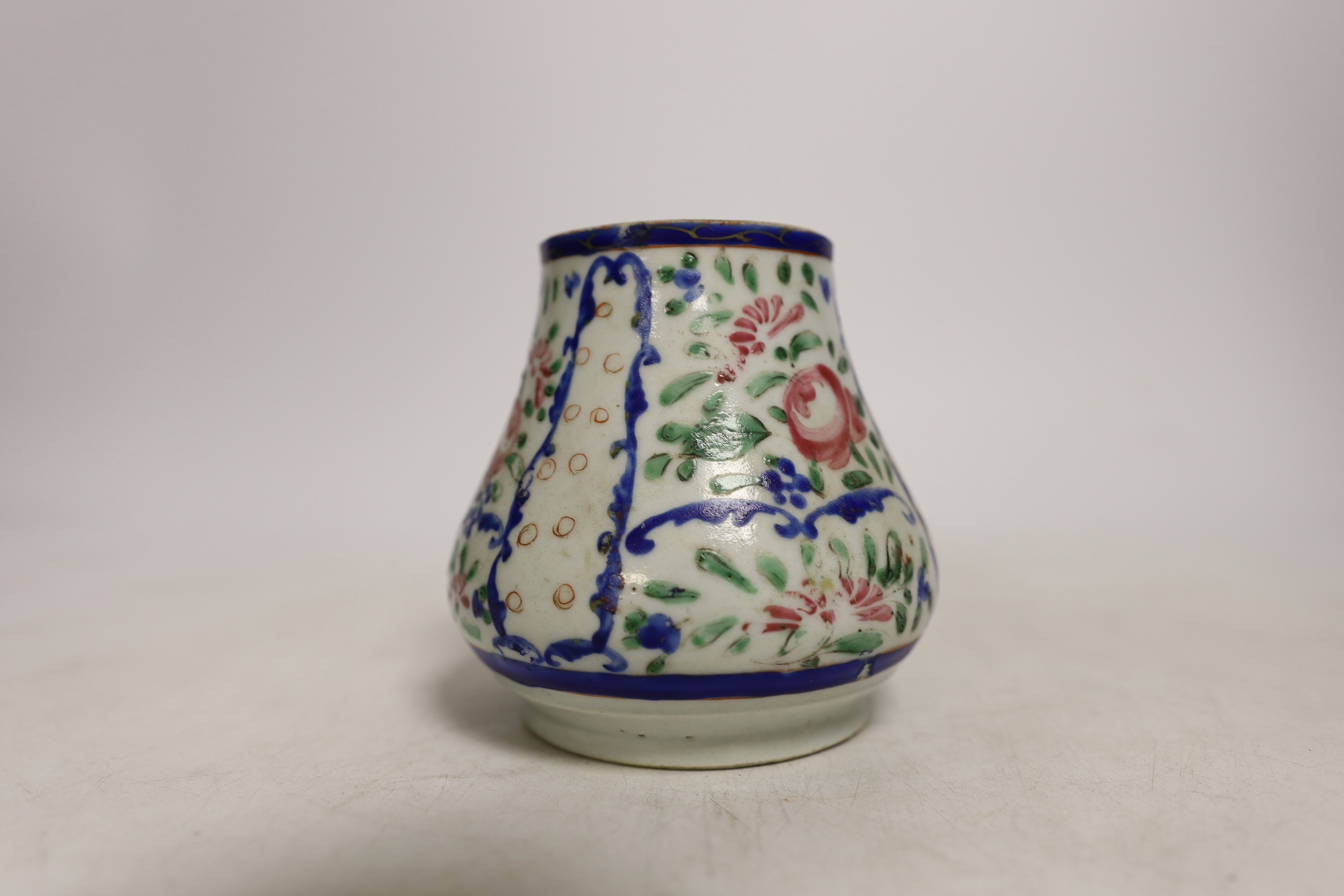 Chinese porcelain- a tall 19th century famille rose vase and cover, a famille rose jar, early 19th century probably made the Indian market, a famille noire jar and a Japanese vase, tallest 28cm high